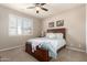 Cozy bedroom with plantation shutters and a comfortable bed with decorative pillows at 3061 S Elderwood --, Mesa, AZ 85212