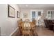 Comfortable dining room with wood table, six chairs and decor at 3061 S Elderwood --, Mesa, AZ 85212