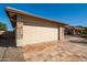 Garage exterior with stone accents and large driveway at 3061 S Elderwood --, Mesa, AZ 85212