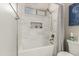 Bathroom with tub and shower combo with subway tile and built-in niche at 3117 S Signal Butte Rd # 501, Mesa, AZ 85212