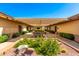 Exterior courtyard with mature landscaping, picnic tables, and covered walkways in a residential community at 3117 S Signal Butte Rd # 501, Mesa, AZ 85212