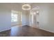 Elegant dining room with a decorative chandelier and views of the exterior at 3527 E Indigo Cir, Mesa, AZ 85213