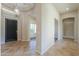 Inviting foyer with tile flooring and views of the living spaces at 3527 E Indigo Cir, Mesa, AZ 85213