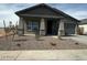 Charming single-story home with neutral stucco, rock landscaping, and attached two-car garage at 36972 W Santa Maria St, Maricopa, AZ 85138