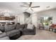 Comfortable living space with a large sectional sofa and bright window, creating a warm atmosphere at 3763 S Laurel Way, Chandler, AZ 85286