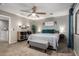 Beautiful main bedroom with neutral colors, bench, and decorative touches at 3763 S Laurel Way, Chandler, AZ 85286