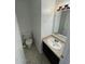 This is a clean and well-maintained bathroom with a white sink, vanity, and tiled floors at 3840 N 43Rd Ave # 73, Phoenix, AZ 85031