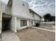 The exterior of this home features a stucco facade, two-story architecture, and well-maintained landscaping at 3840 N 43Rd Ave # 73, Phoenix, AZ 85031