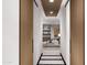 Hallway view into bedroom with wood accents and contemporary decor at 42400 N Sierra Vista 2 Dr, Cave Creek, AZ 85331