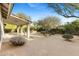 Well-maintained backyard featuring desert landscaping, covered patio, and privacy at 4441 E Via Dona Rd, Cave Creek, AZ 85331