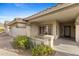 Inviting covered entrance to the home with desert landscaping at 4441 E Via Dona Rd, Cave Creek, AZ 85331