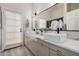 Bathroom featuring a modern vanity with dual vessel sinks, contemporary fixtures, and ample counter space at 5345 E Mclellan Rd # 107, Mesa, AZ 85205