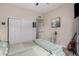 Bedroom featuring wood look floors, a ceiling fan, and neutral walls at 5345 E Mclellan Rd # 107, Mesa, AZ 85205