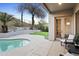 Relaxing backyard with a pool, patio and outdoor seating area at 6348 W Hill Ln, Glendale, AZ 85310