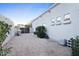 View of side yard features gravel and a privacy fence at 6348 W Hill Ln, Glendale, AZ 85310