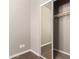 Bedroom closet with mirrored doors reveals shelving and hanging storage at 650 N Hawes Dr # 3622, Mesa, AZ 85207