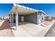 Lovely single-story home with covered parking, blue exterior and a well-kept concrete drive at 650 N Hawes Dr # 3622, Mesa, AZ 85207