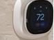 Smart thermostat lets you control home temperature from your phone at 6576 E Whispering Mesquite Trl, Scottsdale, AZ 85266