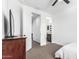 Bright bedroom featuring neutral walls, a ceiling fan, and ensuite bathroom at 7540 E Pampa Ave, Mesa, AZ 85212