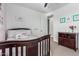 bedroom featuring white walls, decor, and a dark wood crib at 7540 E Pampa Ave, Mesa, AZ 85212