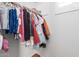 Close-up of organized clothes hanging in a closet space at 7540 E Pampa Ave, Mesa, AZ 85212