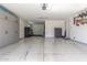 Garage space with epoxy flooring and plenty of storage at 7540 E Pampa Ave, Mesa, AZ 85212