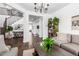 Spacious living room featuring comfortable sofas, a stylish coffee table, and a bookshelf at 7540 E Pampa Ave, Mesa, AZ 85212