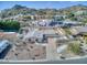 Aerial view of desert home showcasing the front yard and driveway at 7542 N 22Nd Pl, Phoenix, AZ 85020