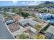 Aerial view of a home with desert landscaping, a pool and a deck at 7542 N 22Nd Pl, Phoenix, AZ 85020