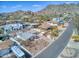 Aerial view shows desert neighborhood near a mountain range at 7542 N 22Nd Pl, Phoenix, AZ 85020