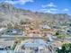 Lovely homes nestled at the foot of a mountain range with a clear blue sky above, offering scenic neighborhood views at 7542 N 22Nd Pl, Phoenix, AZ 85020