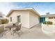 Outdoor patio with an outdoor seating area, a bright turquoise door, and a unique landscape feature at 7542 N 22Nd Pl, Phoenix, AZ 85020