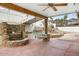 Covered patio features a stone water feature and porch swing at 7542 N 22Nd Pl, Phoenix, AZ 85020