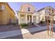 Charming two-story home featuring desert landscaping and a welcoming front porch at 7769 W Bonitos Dr, Phoenix, AZ 85035