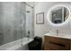 Elegant bathroom featuring a modern vanity, toilet, and glass enclosed shower at 8319 E Columbus Ave, Scottsdale, AZ 85251