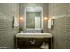 Modern bathroom with gray tile, updated vanity, and stylish lighting at 8319 E Columbus Ave, Scottsdale, AZ 85251