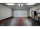 Spacious three car garage with epoxy floors and EV charger at 8319 E Columbus Ave, Scottsdale, AZ 85251