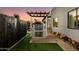 Outdoor kitchen with grill and bar area, perfect for entertaining guests in the backyard at 8319 E Columbus Ave, Scottsdale, AZ 85251