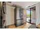 Stainless steel refridgerator in kitchen adjacent to outside balcony at 9125 E Purdue Ave # 214, Scottsdale, AZ 85258