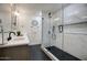 Modern bathroom with glass-enclosed shower, sleek fixtures, and contemporary design at 918 W Carmen St, Tempe, AZ 85283