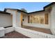 Inviting entryway with bright painted brick and rustic wooden shutters at 918 W Carmen St, Tempe, AZ 85283