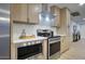 Well-equipped kitchen featuring stainless steel appliances and light wood cabinets at 918 W Carmen St, Tempe, AZ 85283