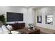 Cozy living room featuring modern decor, hardwood floors, and lots of natural light at 10242 N 58Th St, Paradise Valley, AZ 85253