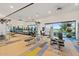 Well-equipped gym with modern exercise machines, treadmills, and weights for a complete workout at 10713 E Tesla Ave, Mesa, AZ 85212