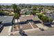 Aerial view of a charming home with mature landscaping, sparkling pool, and a private yard at 10844 N 37Th St, Phoenix, AZ 85028