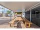 Expansive backyard featuring a covered patio, shed, grilling station, and in-ground pool at 10844 N 37Th St, Phoenix, AZ 85028