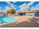 Wonderful pool and patio with outdoor seating, dining area, and a well maintained pool at 10844 N 37Th St, Phoenix, AZ 85028