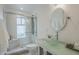 Stylish bathroom with glass shower, unique sink, and modern fixtures at 10844 N 37Th St, Phoenix, AZ 85028