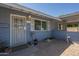 Charming covered entryway with brick flooring and an updated front door with a security screen at 10844 N 37Th St, Phoenix, AZ 85028