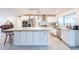 Bright, spacious kitchen with a granite island, stainless steel appliances, and ample counter space at 10844 N 37Th St, Phoenix, AZ 85028